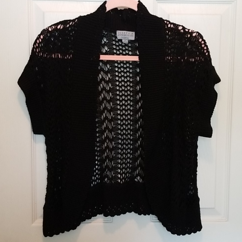 Crochet short sleeve cardigan.